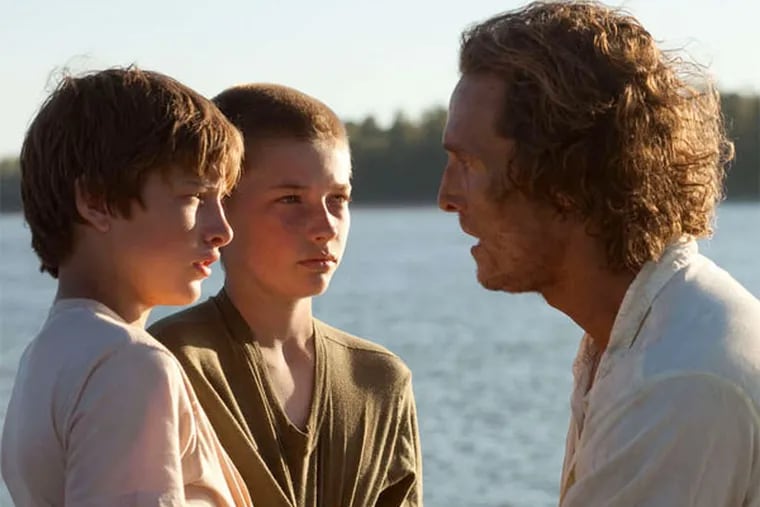 Matthew McConaughey (right) with (from left) Tye Sheridan and Jacob Lofland in &quot;Mud.&quot;