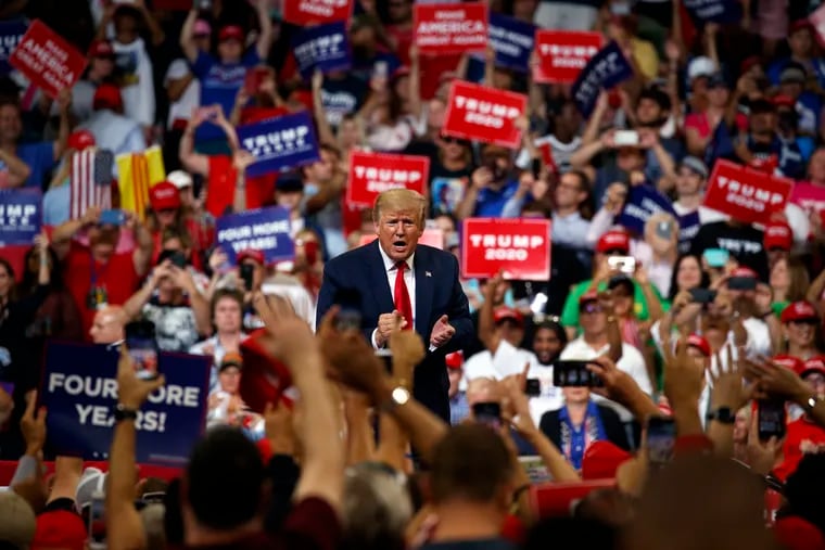 President Donald Trump reacts to the crowd after speaking during his reelection kickoff rally at the Amway Center, Tuesday, June 18, 2019, in Orlando, Fla.