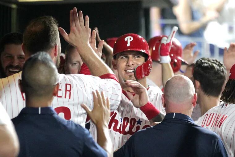 Phillies' catcher Wilson Ramos is congratulated after scoring during the Phillies' 7-4 win over the Red Sox on Wednesday.