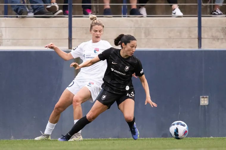 Christen Press (right) on the ball during Angel City FC's NWSL Challenge Cup home game against the San Diego Wave on March 19.