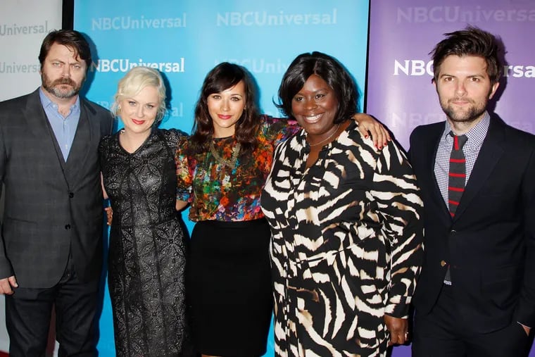 The cast of Parks and Recreation (from left) Nick Offerman, Amy Poehler, Rashida Jones, Retta Sirleaf, and Adam Scott, arrive for the NBCUniversal Press Tour Party in Pasadena, Calif., in 2012. Photo by Francis Specker