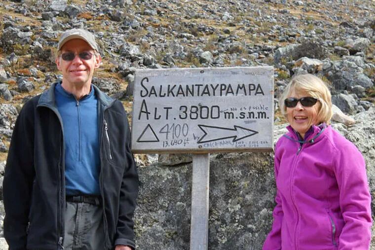 The writer and his companion, Ann, at Salkantay Pass, elevation 15,213 feet, on the third day of their hike to Machu Picchu. The mountain scenery included glaciers,