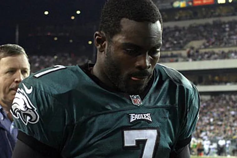 Eagles quarterback Michael Vick suffered a concussion against the Cowboys. (Yong Kim/Staff Photographer)