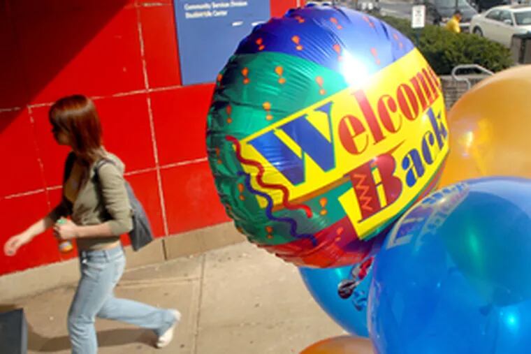 &quot;Welcome Back&quot; balloons marked the resumption of classes at Community College of Philadelphia. Union members approved contracts Sunday and Monday. But now, work must be made up.