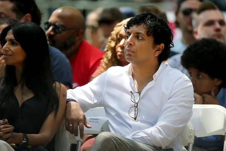 Filmmaker M. Night Shyamalan watches during the Celebration of Freedom Ceremony at Independence Hall last year.