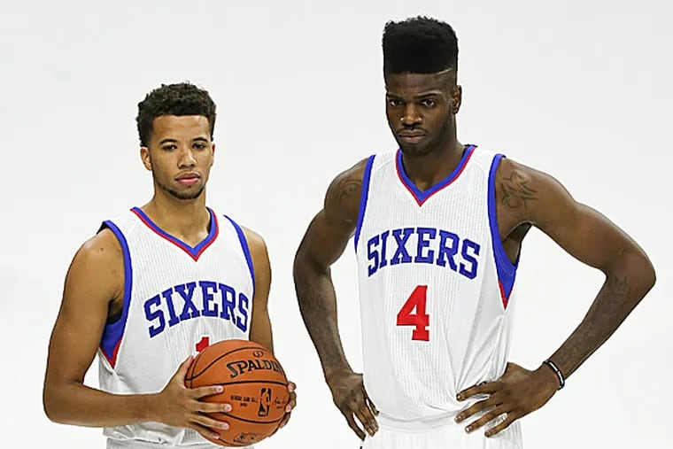 76ers guard Michael Carter-Williams and forward Nerlens Noel. (Bill Streicher/USA Today Sports)