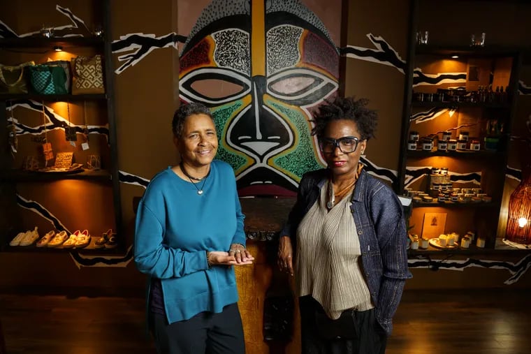 Dagmar Mitchell and Dorothea Gamble at their store, Trunc. On the back wall center, is a mural by Ian Bunji Gamble, Dorothea's son.