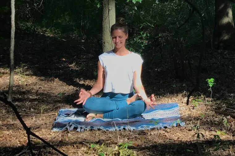 Lauren Theis lead a forest bathing event Saturday, April 21, 2018 at the Franklin Parker Preserve in Burlington County, N.J.