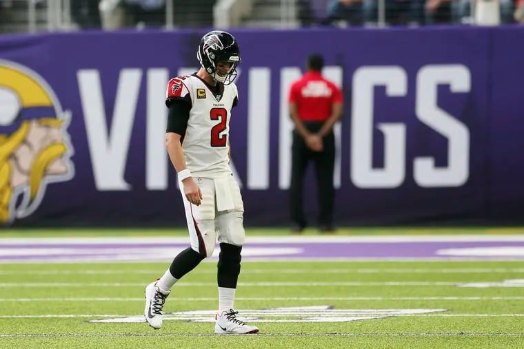 Atlanta Falcons quarterback Matt Ryan walks to the sideline during the first half of Sunday's 28-12 loss to the Minnesota Vikings. The Exton native will face the Eagles this week.