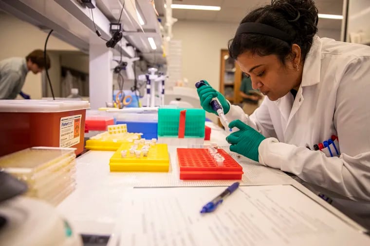 At the University of Pennsylvania, Garima Dwivedi analyzes serum from mice that have been vaccinated against multiple coronaviruses.