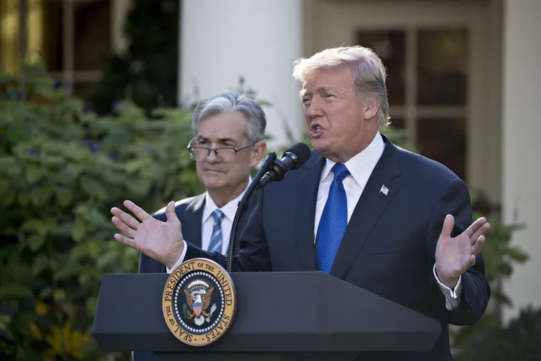 President Trump speaks as Jerome Powell. then a governor of the Federal Reserve, listens in the Rose Garden of the White House in Washington, D.C., as Trump nominated Powell for Fed chairman on Nov. 2, 2017.