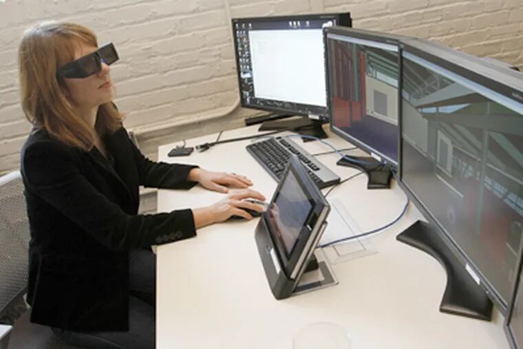 At GPIC's Immersive Construction Lab, Dragana Nikiolic sets up a virtual building mock-up in 3-D. The exercise is used in the development of buildings that make more efficient use of energy. (Michael S. Wirtz/Staff)