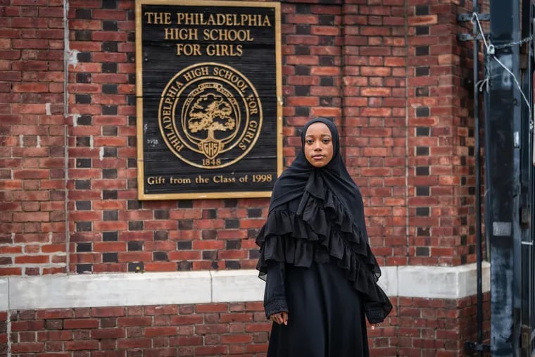 Hafsah Abdul-Rahman, outside Girls' High School. Abdul-Rahman was one of the Girls' High graduates initially denied her diploma because she danced across the stage, causing an audience member to laugh. The Girls' High Alumnae Association has come out in support of the Girls' High principal's actions.
