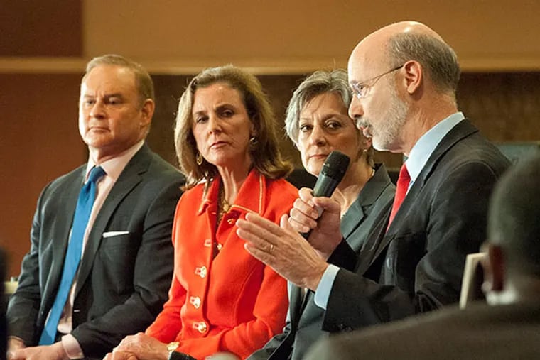 Tom Wolf (right) speaks as Rob McCord , Kathleen McGinty and Allyson Schwartz listen during a public forum for the Democratic candidates vying for the nomination to run against incumbent Gov. Tom Corbett on Monday, May 12, 2014.  ( CLEM MURRAY / Staff Photographer )