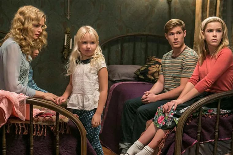 &quot;Flowers in the Attic&quot; stars Heather Graham (left) as mom Corrine Dollanganger, up above the rafters with children (from left) Carrie (Ava Telek), Christopher (Mason Dye) and Cathy (Kiernan Shipka).