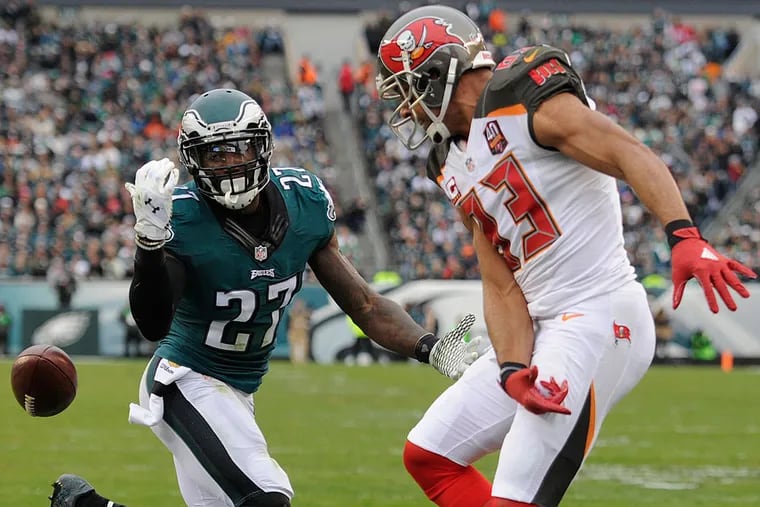 Malcolm Jenkins can't hang onto the ball intended for Buccaneers receiver Vincent Jackson.