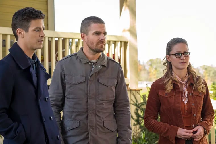 From left: Grant Gustin as Oliver Queen/Green Arrow, Stephen Amell as Barry Allen/The Flash and Melissa Benoist as Kara/Supergirl in the first leg of a three-show crossover that begins Sunday, Dec. 9 with "The Flash"