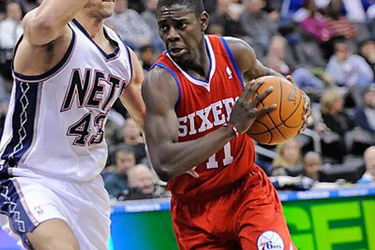 Jrue Holiday scored 19 points for the Sixers in their win over the Nets. (Bill Kostroun/AP)