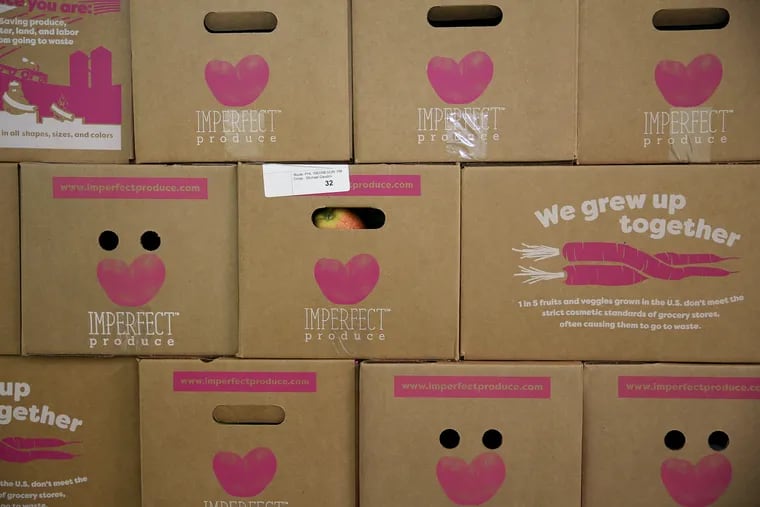 Boxes sit on a pallet at the Imperfect Produce warehouse in Pennsauken. The company sells packages of surplus produce that do not meet the aesthetic standards required by grocery stores.