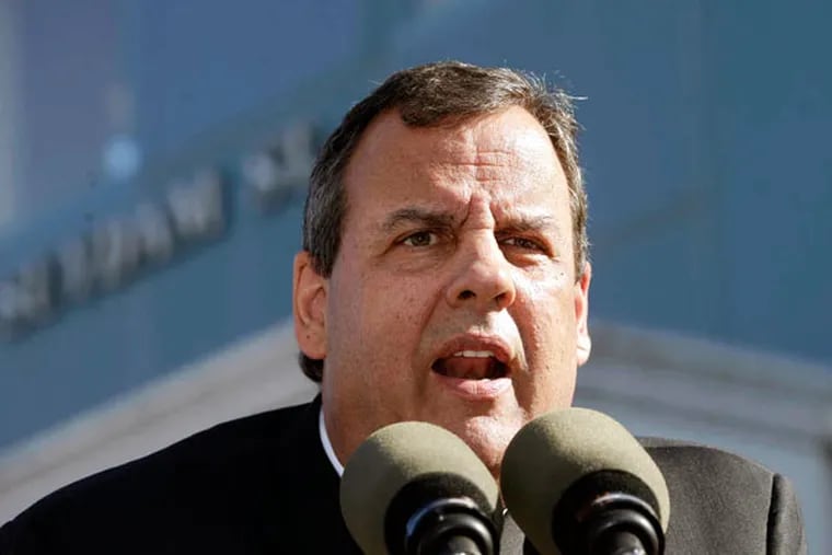 Gov. Christie's administration is set to argue that a 2011 law he signed granting greater pensions to public workers is unconstitutional. (AP Photo/Mel Evans)