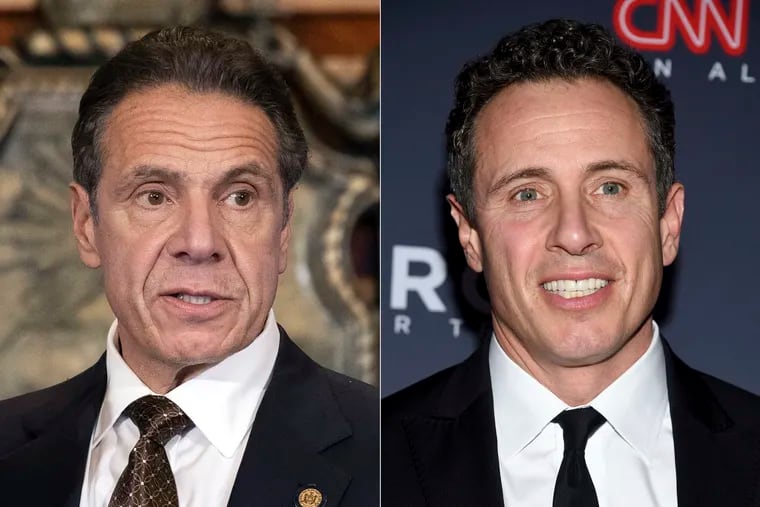 Former New York Gov. Andrew Cuomo (left) and his brother, CNN anchor Chris Cuomo (right).