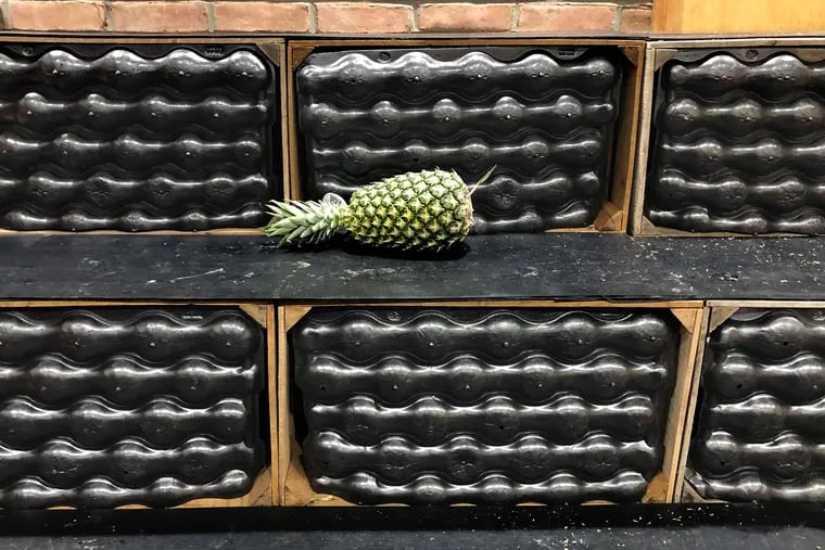 A single pineapple is alone on the empty fruit shelves at the Wegmans in Towne Place at Garden State Park, on Route 70 in Cherry Hil.
