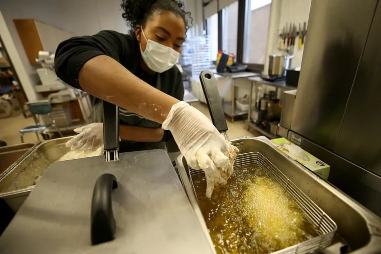 Chef Joy Parham prepares the buttermilk fried chicken at Kampar Kitchen inside the Bok building in Philadelphia, Pa. on January 24, 2021.