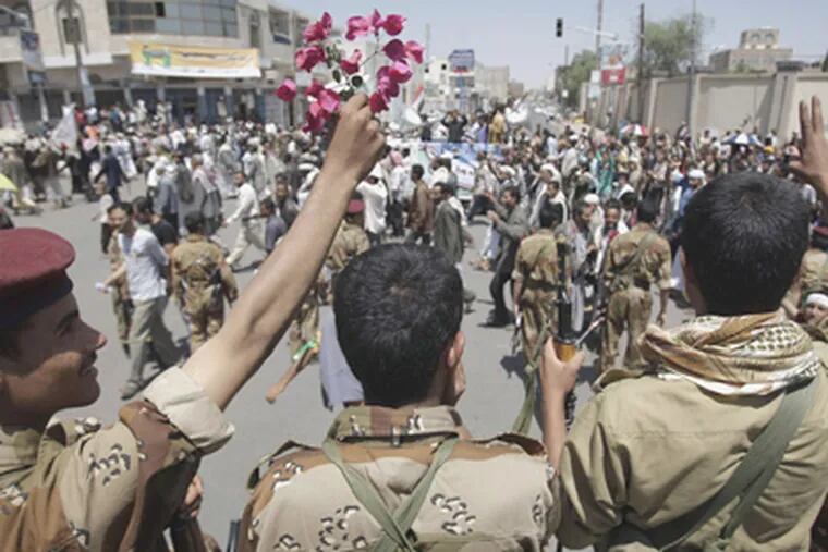 Soldiers join protesters calling for Yemen's president to resign. (Hani Mohammed / Associated Press)