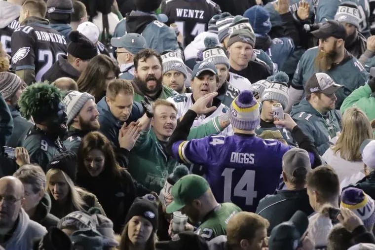Eagles fans shout at Vikings fan at halftime during the NFC Championship game at Lincoln Financial Field on Sunday.