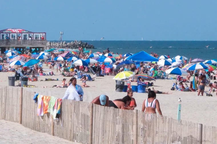 Beachgoers enjoy a sunny day at Point Pleasant Beach, N.J., in 2019.