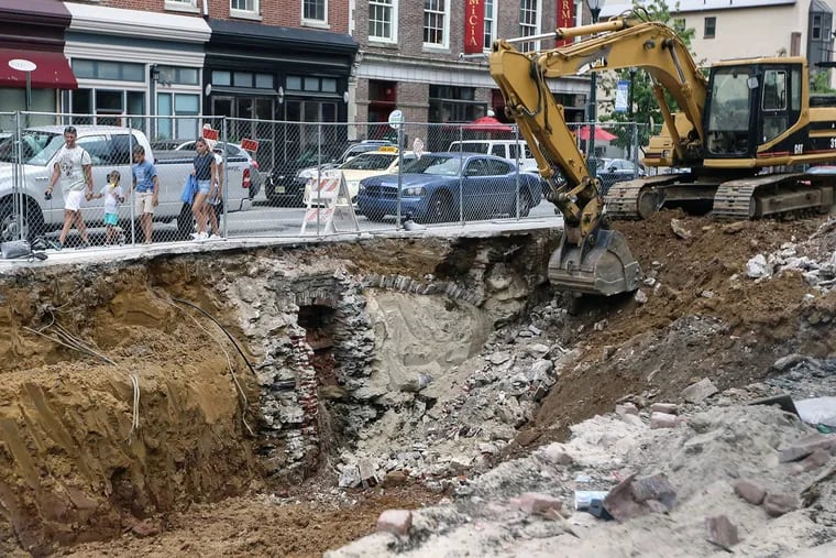 Excavation reveals one of the two brick arches that were under the Suit Corner at Third and Market Streets. A jail was on the site in the 18th century — and it’s possible the construction even predates the Revolution.