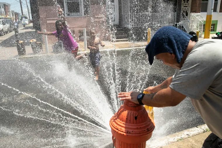 In summer 2021, Philadelphians in the Hunting Park neighborhood, which faces the highest heat index in the city, cooled off in a fire hydrant.