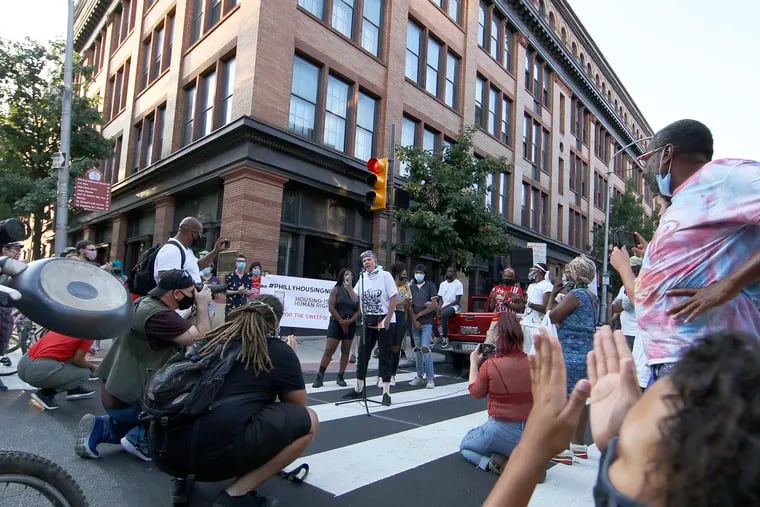 Protesters gathered outside Mayor Jim Kenney's condo building at Third and Race Streets in September. Police and activists clashed at another protest Tuesday outside the building.