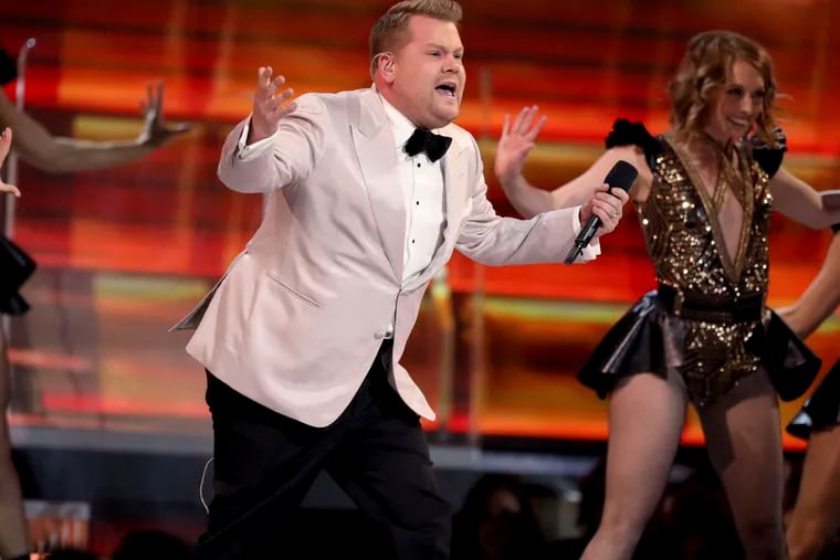 James Corden rapped, did a comic pratfall, cracked jokes about nominees, and took a political shot or two.