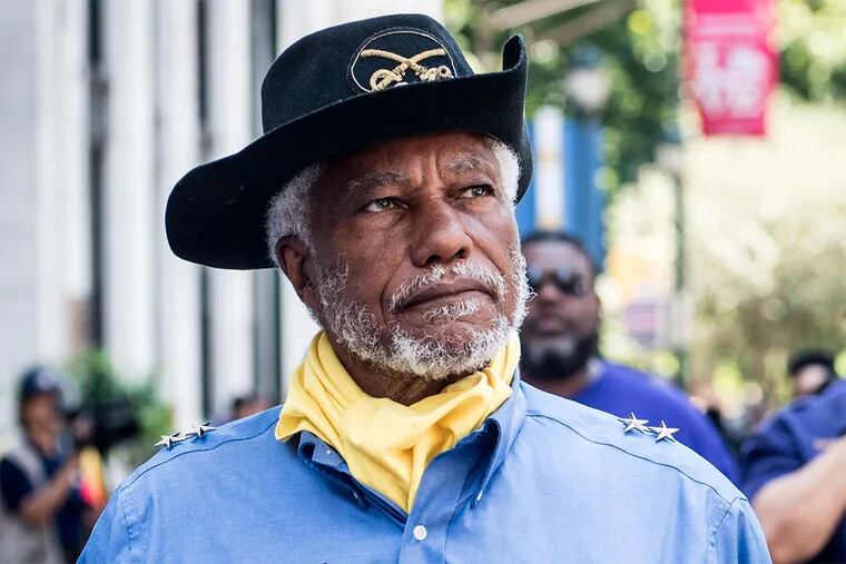 Milton McIntyre marches in a Buffalo Soldier uniform during the Juneteenth parade Saturday in Philadelphia, which commemorated the 151st anniversary of the end of slavery.