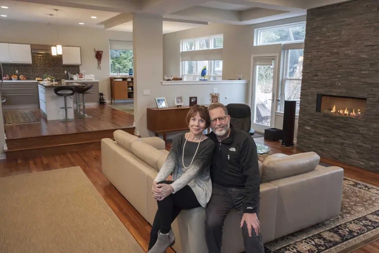 Lynne Barol and Arnold Chassen in the living room of their rebuilt home in Penn Valley, Pa. Their previous home was destroyed by a fire several years ago.
