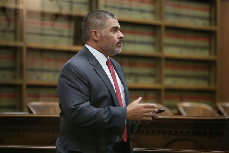 In this Oct. 17, 2018 photo, McLennan County District Attorney Abelino Reyna arrives for a hearing in 54th District Court during a hearing in Waco, Texas. Local leaders say a plea deal allowing a former Baylor University fraternity president to serve no jail times highlights the outsized influence alumni play in shaping the criminal justice system in and around Waco. Jacob Walter Anderson was accused of raping a woman outside a 2016 fraternity party. The plea agreement allows him to avoid jail or being listed as a sex offender. The judge, prosecutor and defense attorney in the case all have degrees from Baylor. (Rod Aydelotte/Waco Tribune-Herald via AP)