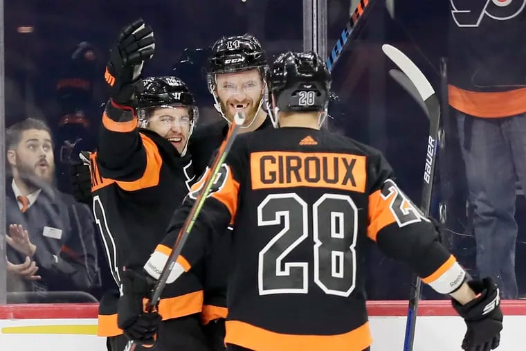 Smiles all around. Real hockey is back. Claude Giroux, Travis Konecny (left), Sean Couturier and the Flyers will open round-robin play on Sunday against Boston (3 p.m., NBC10).