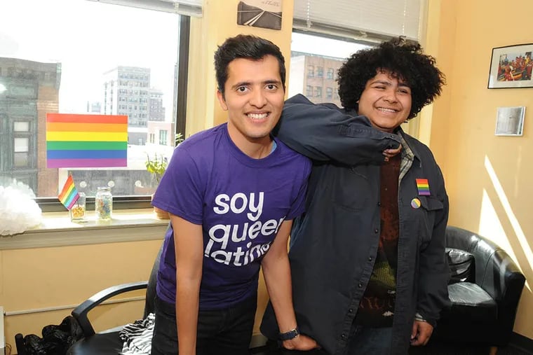 Francisco Zavala Cortes (left), youth coordinator of GALAEI, with Emmanuel Coreano, a member of the organization. (CLEM MURRAY / STAFF PHOTOGRAPHER)
