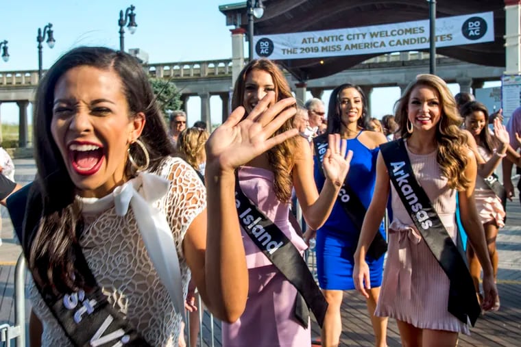 The Miss America contestants, including Miss West Virginia Madeline Collins (left) arrive on the Boardwalk in Atlantic City to kick off the 2019 pageant August 30, 2018. TOM GRALISH / Staff Photographer