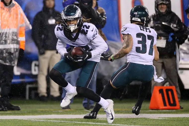 Eagles cornerback Sidney Jones (22) intercepts a pass intended for New York Giants wide receiver Darius Slayton during the fourth quarter.