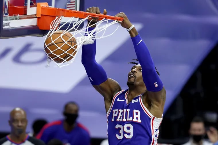 Dwight Howard of the SIxers dunks against the Heat during the 1st half of an NBA game at the Wells Fargo Center on Jan. 12.