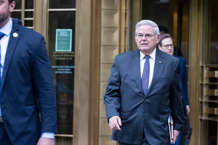U.S. Sen. Bob Menendez, D-N.J., leaves Manhattan federal court after the second day of jury selection in his trial on Tuesday in New York.