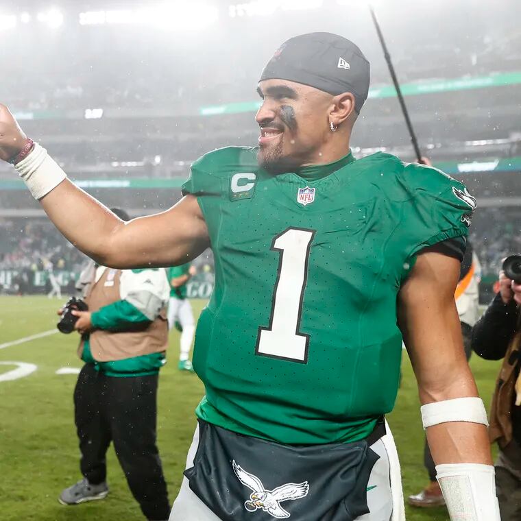 Eagles quarterback Jalen Hurts points after beating the Buffalo Bills in overtime 37-34 on Sunday, November 26, 2023 in Philadelphia.
