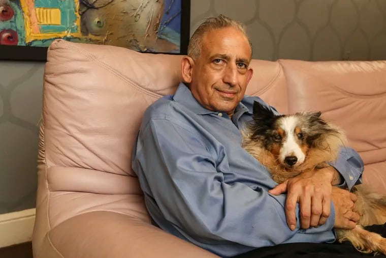 Steven Sigal, who turned in a murderer and was refused a reward by Philadelphia Police, sits at home with his dog Delta, one of three Shelties he lives with in his North Philadelphia home.