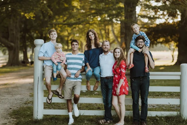 Bridget Hunt (center) and her husband Steve Hunt, with their six children. The two met in the mid-2000s at Gordon College in Massachusetts when Bridget, as a college freshman, took Steve's religion course.