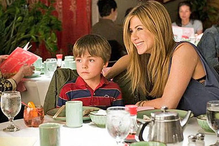 Jennifer Aniston, right and Thomas Robinson are shown in a scene from "The Switch." (AP Photo/Miramax Films-Disney, Macall Polay)
