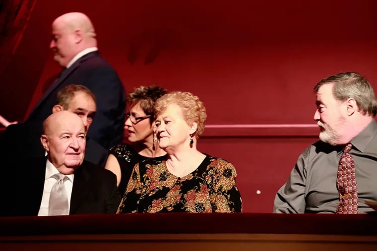 James and Barbara Kenney and family members wait for Jim Kenney to be administered the oath of office by Justice Kevin Dougherty at the Academy of Music Monday.