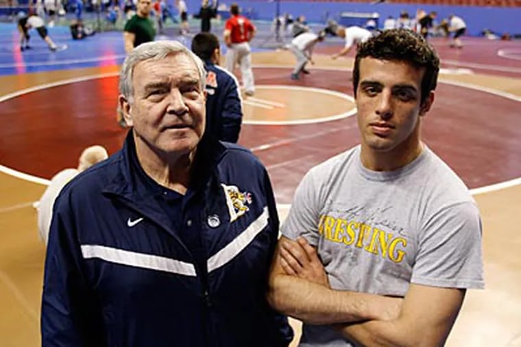 Drexel's wrestling head coach Jack Childs and wrestler Joe Booth. (David Maialetti/Staff Photographer)