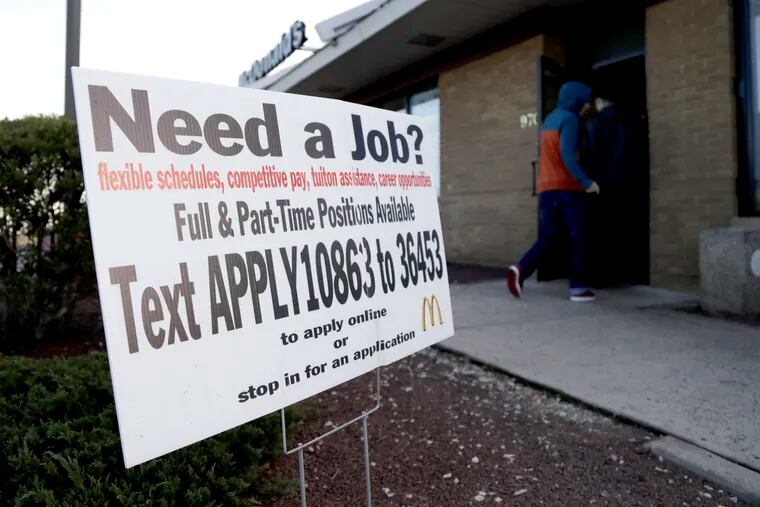 In this Jan. 3, 2019, file photo customers enter a McDonald's restaurant near an employment sign visible in Atlantic Highlands, N.J. On Wednesday, March 6, payroll processor ADP reports how many jobs private employers added in February.